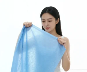 Hydrophilic Non-woven Fabric Roll - Mingtak Roll of white hydrophilic non-woven fabric for diaper manufacturing